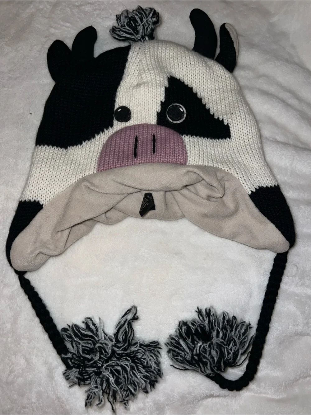 Kyber outerwear Kids Cow Earflap Hat - Black, White & Pink